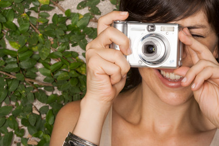 Hispanic woman with camera