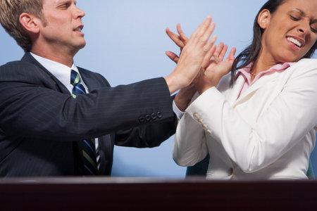 Competition between staff in officeの写真素材