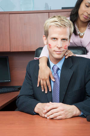 Woman seducing man in office