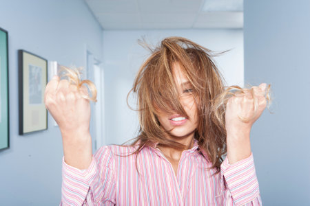 Angry woman in officeの写真素材