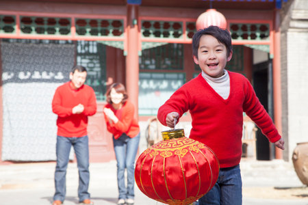 Family portrait dressed in holiday attireの写真素材