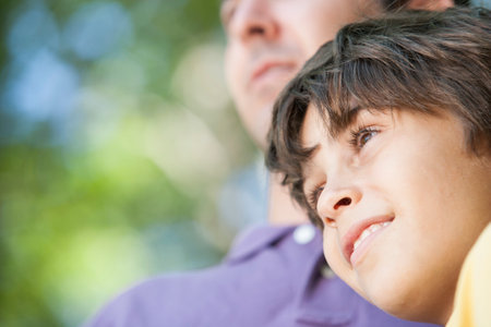 Portrait of father and son together in natureの写真素材