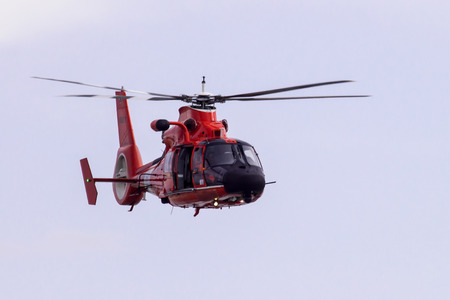 Galveston Island, Texas, USA - January 6, 2012;  A Coast guard helicopter patroling off Galveston Islandのeditorial素材