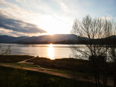 Sunset over Lake Banyoles. Moments of relaxation in winter.の写真素材