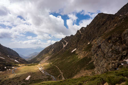 Panoramic views of the Unarre valley, from the Gola pond. Sunny day with some clouds, early spring.の写真素材