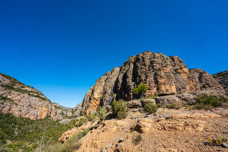 Gorge of Collegats in the Pyrenees. In the middle of spring. On a sunny day with no clouds in the sky and a completely blue sky.の写真素材