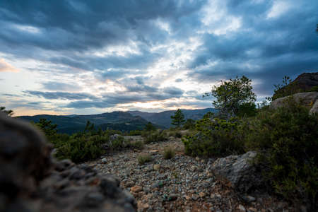 Sunset over the mountains next to the town La Pobla de Segur.の写真素材