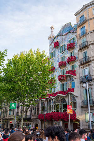 BARCELONA, SPAIN, APRIL 23, 2021: Casa Batllo in Barcelona, one of the most beautiful houses on Passeig de Gracia. By the architect Antoni Gaudi. Decorated with roses for St. Georges Day.のeditorial素材