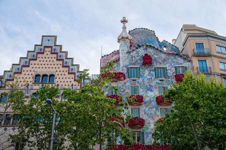 BARCELONA, SPAIN, APRIL 23, 2021: Casa Batllo in Barcelona, one of the most beautiful houses on Passeig de Gracia. By the architect Antoni Gaudi. Decorated with roses for St. Georges Day.のeditorial素材