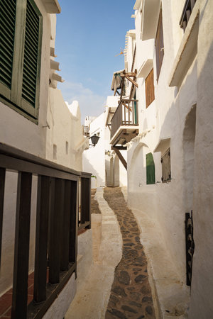 Binibeca, Menorca. September 2021. Nice town on the island of Menorca. Coastal town with all the houses painted white.の写真素材