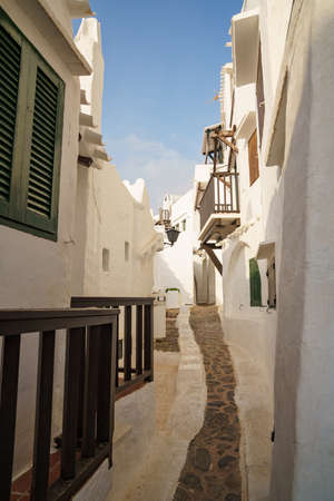 Binibeca, Menorca. September 2021. Nice town on the island of Menorca. Coastal town with all the houses painted white.の素材 [FY310182561303]