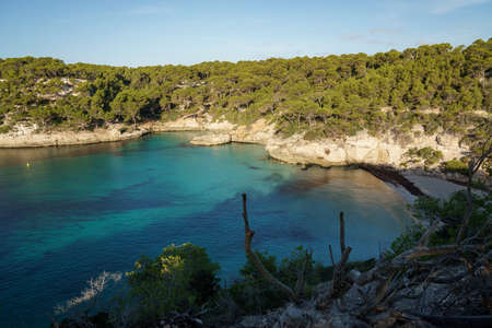 Cala Mitjana, Menorca. September 2021. Paradisiacal beaches, without people in the middle of the Mediterranean.の写真素材