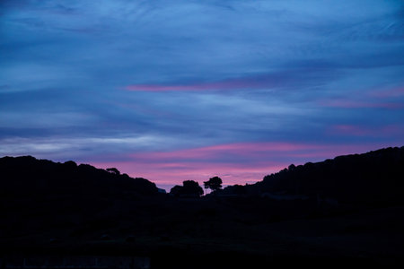 Sunrise behind the Toro mountain in Menorca.の写真素材