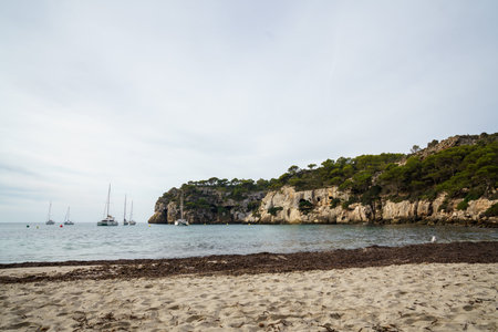Cala Macarelleta, Menorca. September 2021. Paradise beach on the island of Menorca. Perfect place to relax and enjoy nature in summer.の写真素材