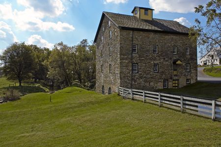 Old Amish Home made of Rocks along Brookの写真素材