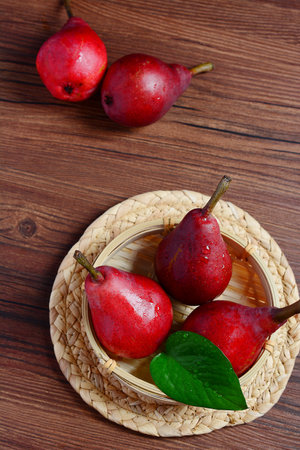 Red Pears in a basketの写真素材