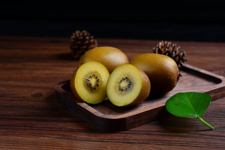 kiwi fruit on a black backgroundの写真素材