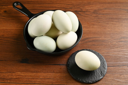 Close up colorful red yolk of salted duck eggs preserved in bamboo basket, asian style foodの写真素材