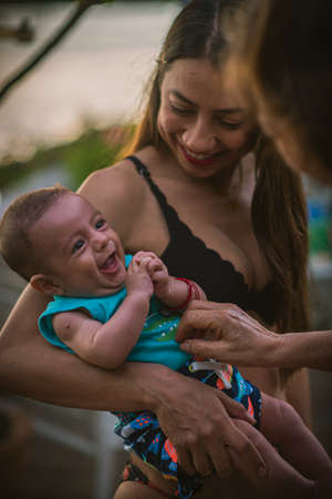 Mom with her baby boy laughingの写真素材