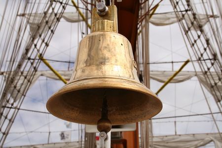 Boat bell aboard a sailboatの写真素材