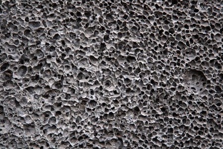 close up of a volcanic stone background or textureの写真素材