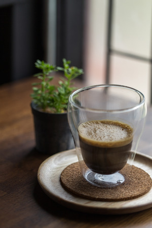 Espresso Macchiato on wooden tableの写真素材