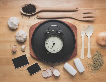 Rural kitchen utensils on wooden table from above,breakfast concept,vintage styleの写真素材