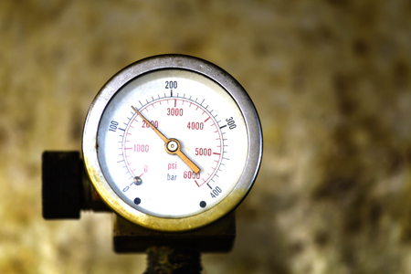 Pressure gauge with rust background