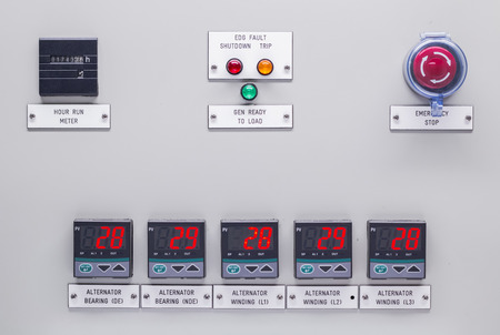 Electrical control panel containing has a digital temperature gauge with an emergency push button...