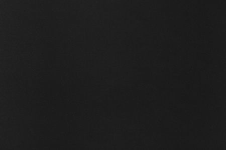 Black flat blank paper background texture. Copy space, room for text, lettering.の写真素材