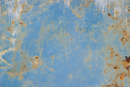 colored background. old rusty blue metal surface. texture of cracksの写真素材