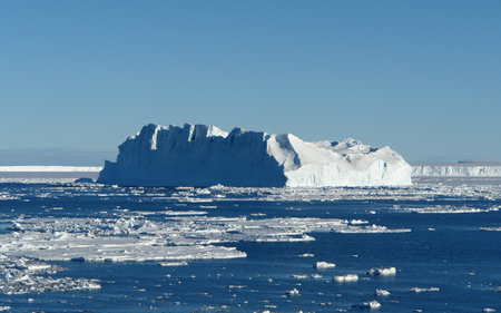 Antarctica ice cold icebergs sea and blue sky travel