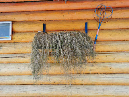 log wall of the house is orange with accessories
