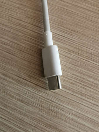 Mobile Phone Charger Plug White on the table