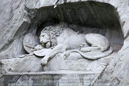 Lewendenkmal, the lion monument landmark in Lucerne, Switzerland. It was carved on the cliff to honor the Swiss Guards of Louis XVI of France. Outdoors, copy space.の写真素材