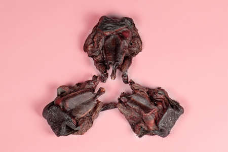 Three pieces of dehydrated beef noses, used like dry dog treats, with little fur on edges. Home-made...