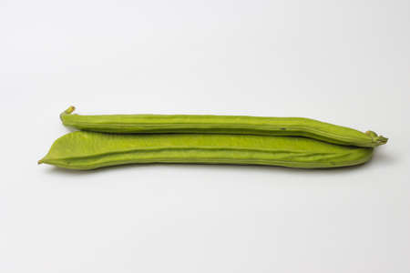 Fresh healthy green beans on white backgrouns