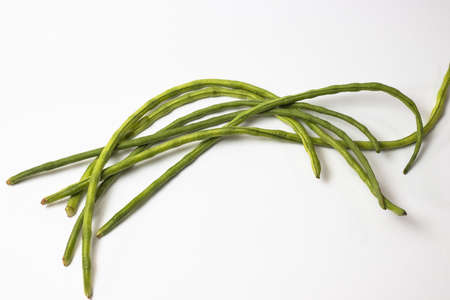 Isolated green long bean on white backgroundの写真素材