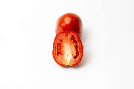 Isolated fresh red sliced tomatoes