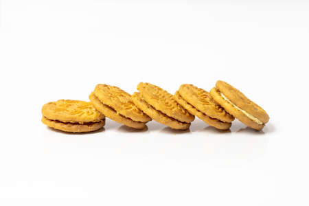 Stair of delicious creamy cheese circle biscuit isolated on white background