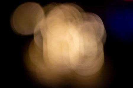 Abstract soft diffused light effects, Soft bokeh effect on dark backgroundの写真素材