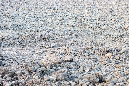 Preparing soil for plant new crops, plowed and dug soil for backgroundの写真素材