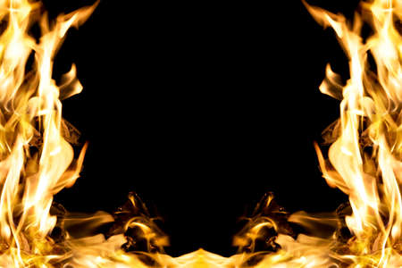 Frame with intense vibrant fire flame on black backgroundの写真素材