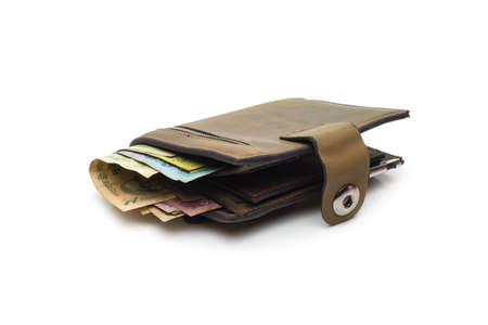 Old leather wallet with few bangladeshi banknotes on isolated white background
