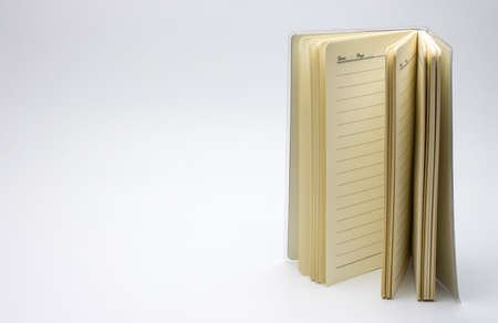 Open vertical empty notebook on a white background with copy space