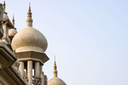 Cracked old mosque dome under the cloudy sky with copy space