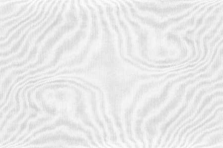 Abstract waves pattern on white color linen fabric for texture backgroundの写真素材