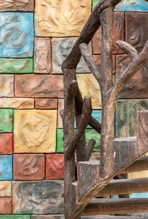 Decorative stair with colorful stone wall inside of a park