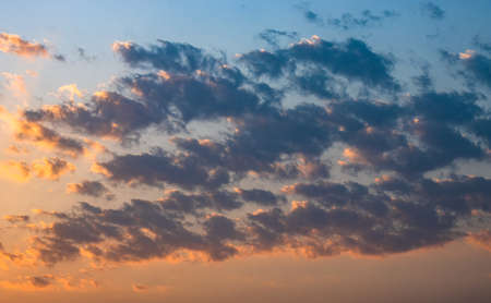 Dramatic evening sky with scattered clouds