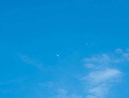blue sky background with tiny clouds, soft focus, and copy spaceの写真素材